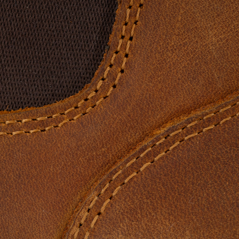 Close-up of Dive Bomb Tobacco Brown Heritage Boot with visible stitching