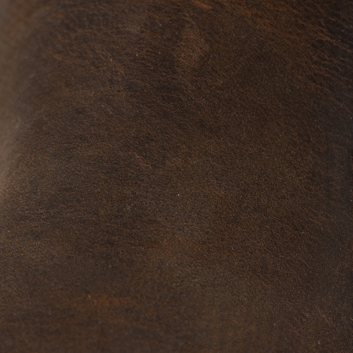 Close-up of Dive Bomb Dark Walnut Heritage Boot of the full-grain cowhide texture.