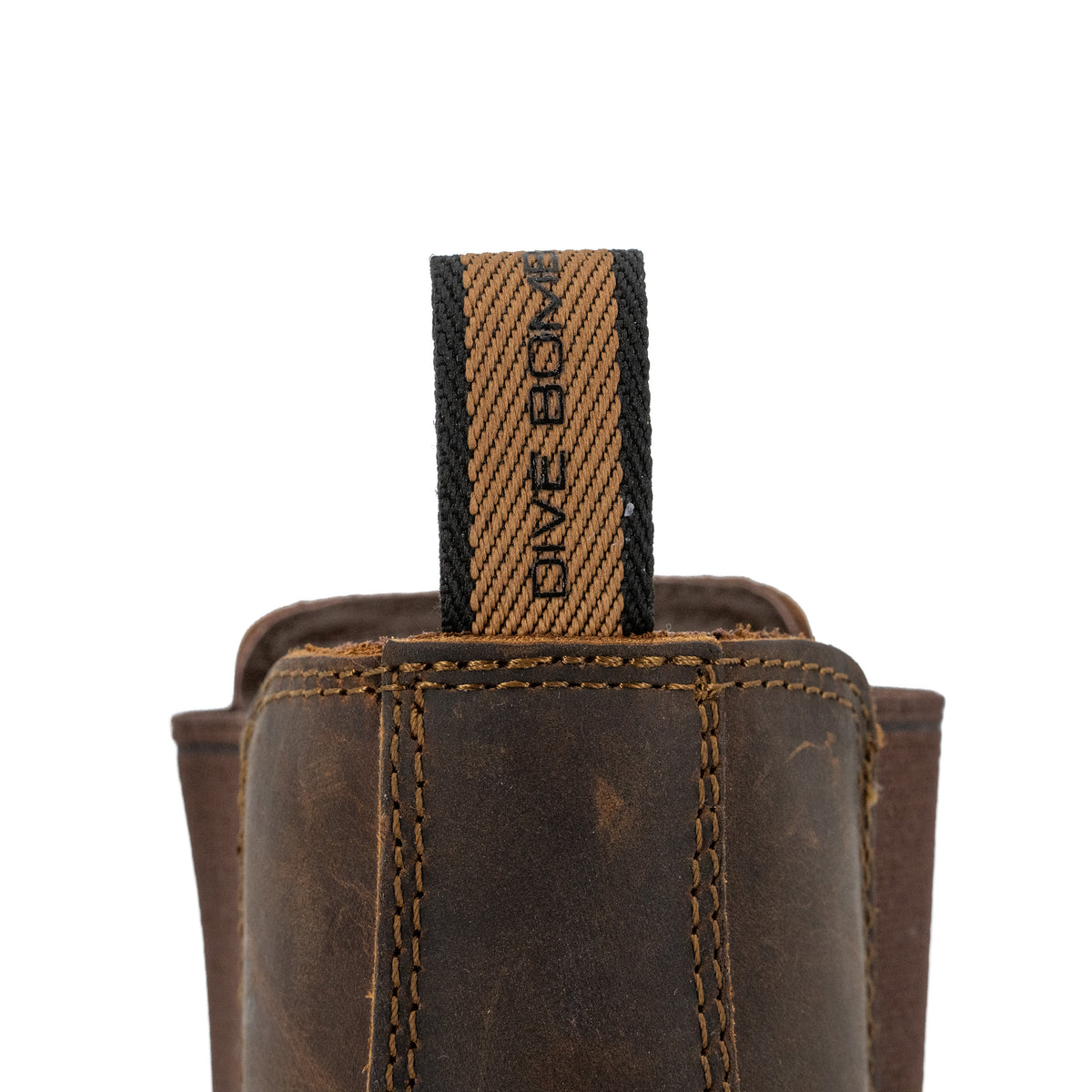 Close-up of the pull tab on a Dive Bomb Dark Walnut Heritage Boot. 