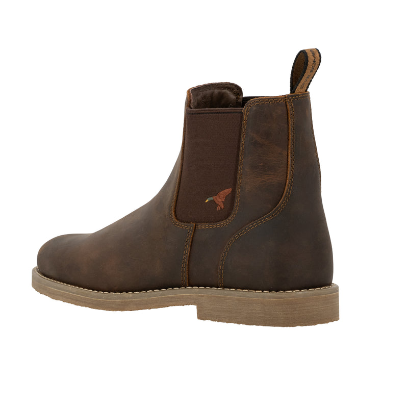 Dive Bomb Dark Walnut Heritage Boot, a Chelsea style boot. Heel view with an embroidered mallard logo.