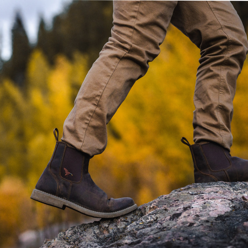Dive Bomb Dark Walnut Heritage Boot on a hike, boot has a full-grain cowhide upper.